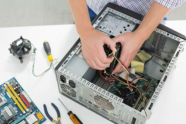 Replacing a hard drive during a desktop repair at Cadlinc Infotech Bangalore